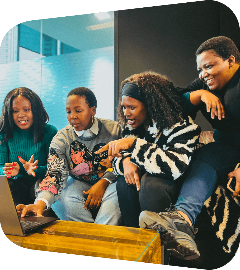 iKhokha team working behind laptop