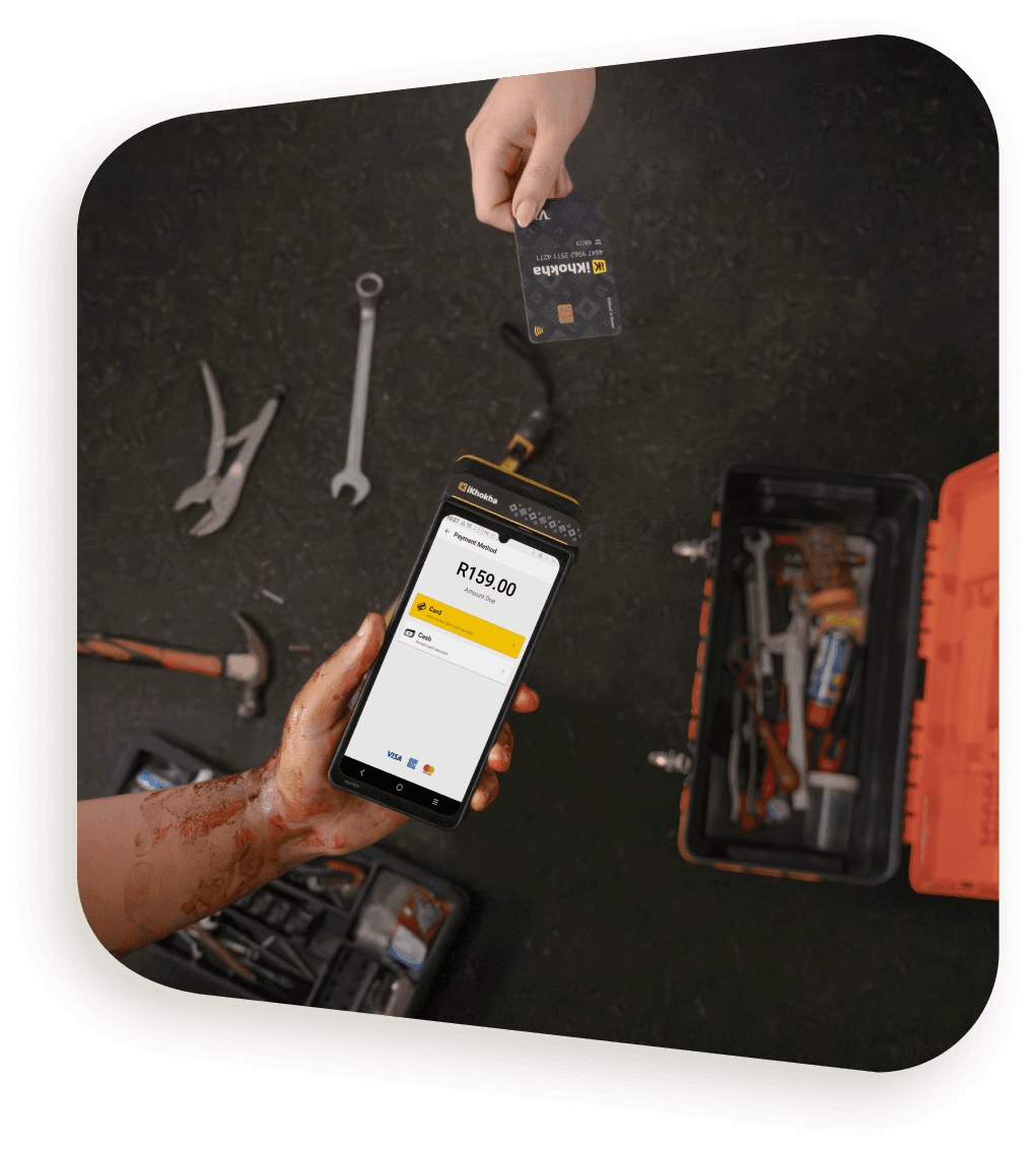 man selling in tuck shop