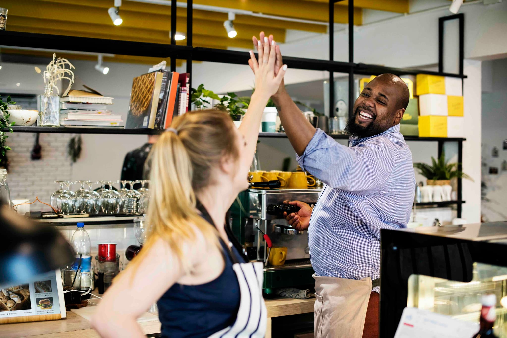 business growth with colleagues high-fiving